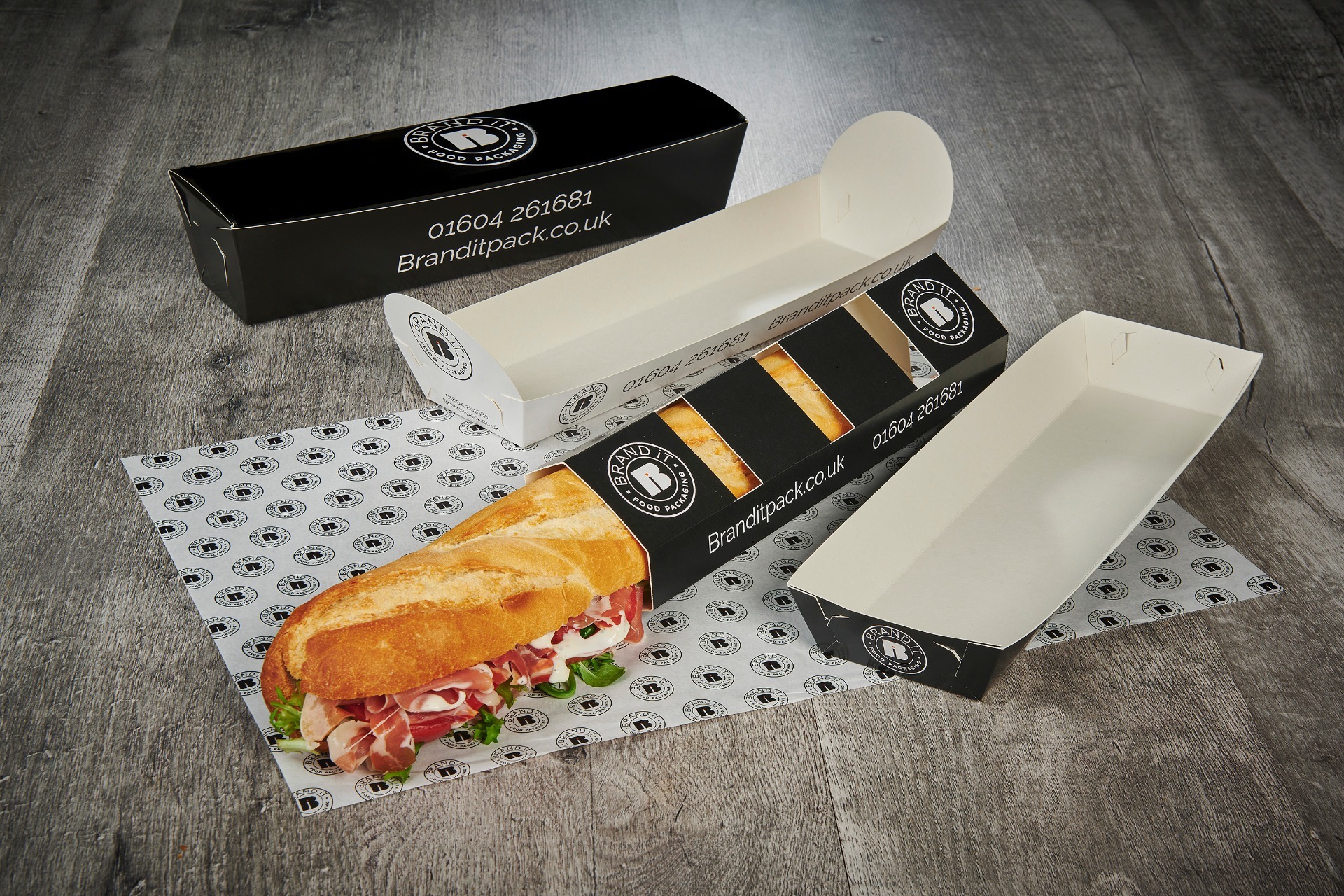 Flat pack, branded baguette trays
